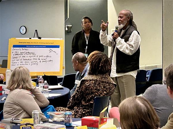 community members discussing budget